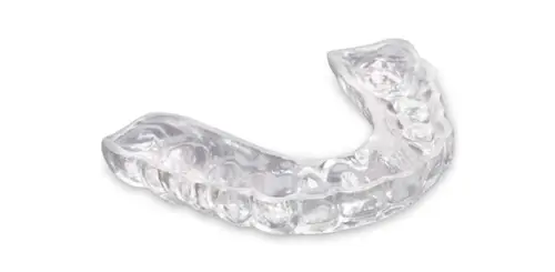 Appliance Therapy Image of a clear dental night guard with a white background